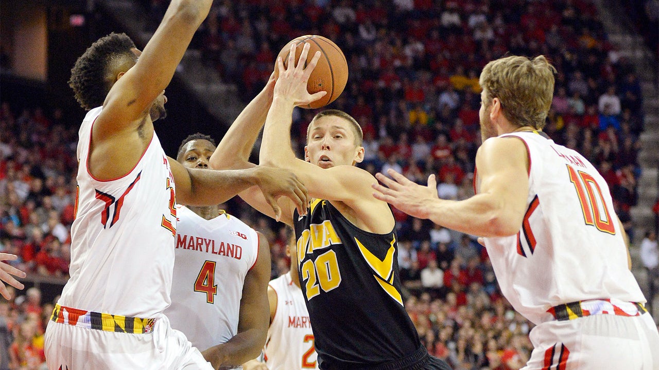 No. 8 Maryland squeezes past No. 3 Iowa 74-68